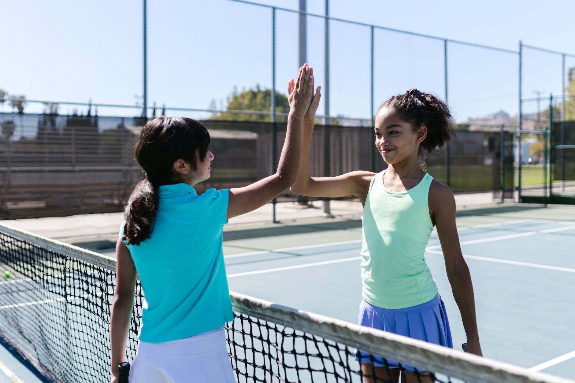 girls playing tennis