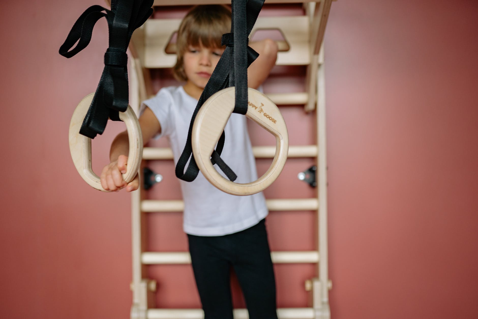 boy using equipment for gymnastics